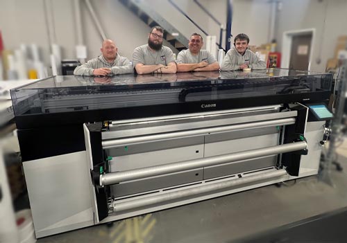 Ainsley signs with a Canon Colorado 1650 UVgel roll printer from CMYUK.
