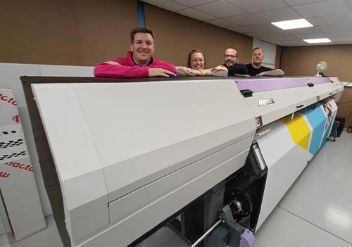 Chris Norman, Founder and Sarah Hamilton from Event Technology Group with a Mimaki UJV55-320 dedicated 3.2m roll-to-roll printer