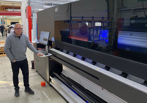 Antony Rider from Rocket Graphics with an EFI VUTEk 5r+ UV LED 5m roll-to-roll printer from CMYUK.