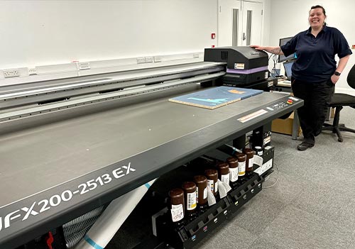  Charlotte Cooper, Production Manager at WF Education with a Mimaki JFX200-2513 EX from CMYUK