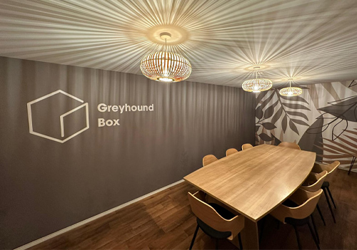Greyhound Box’s on-site portacabin meeting room tansformed using the PONGS® Descor® track system.