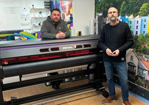 Gareth Jenkins and James Taylerson from Paramount with a Mimaki UCJV300 -160 printer cutter from CMYUK.