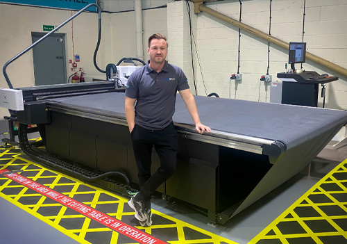 David Blackholly from Verve Display with a  Kongsberg X24 digital cutting table from CMYUK